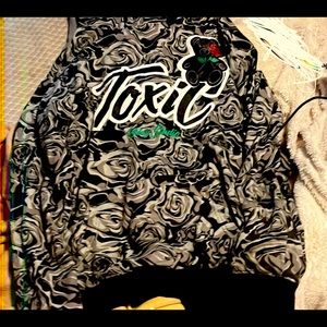 grey and back toxic hoodie with little black bear and roses.